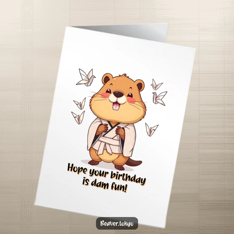 Funny Free Printable Birthday Card: Chubby beaver in a patterned kimono skillfully juggling origami cranes.